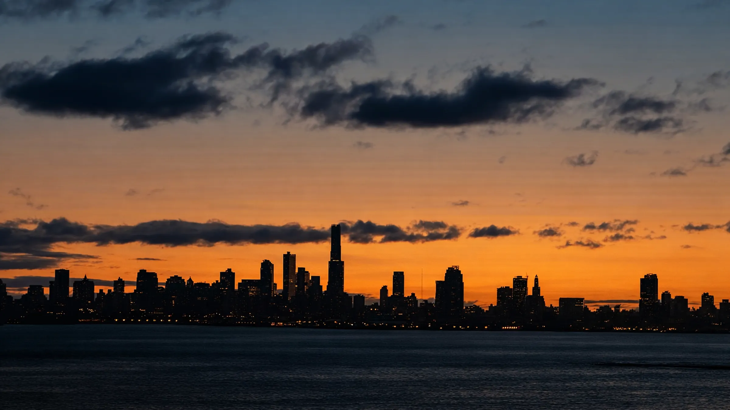 The Chicago skyline at dusk across the water